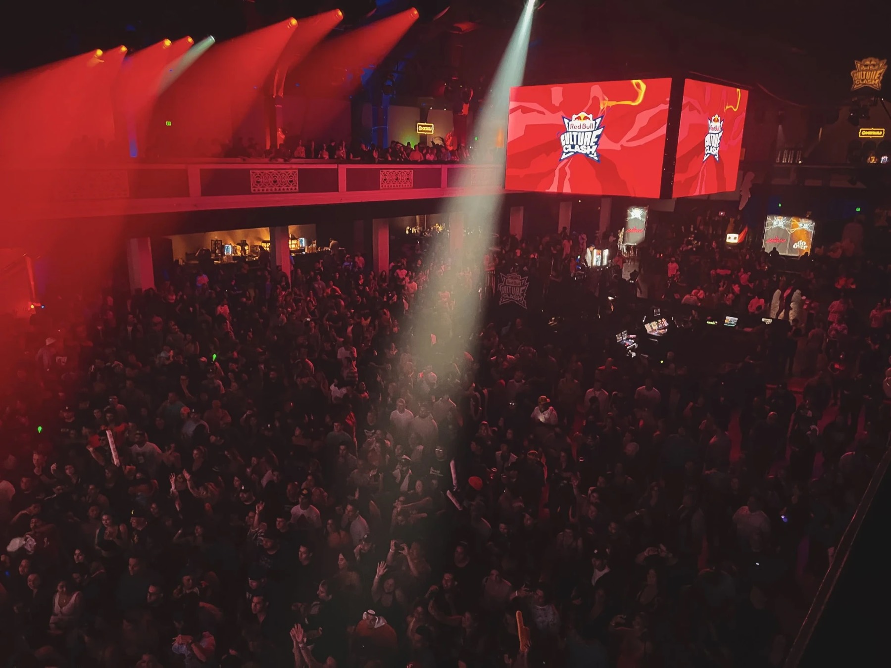 Red Bull Culture Clash under red lighting and a floating LED cube